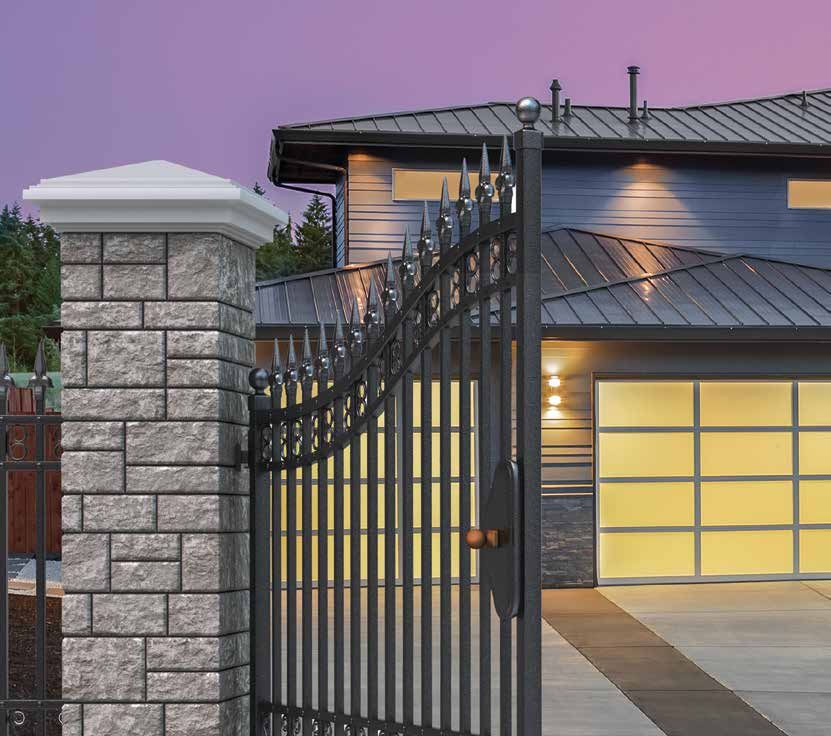 Automated garage door and gate at dusk